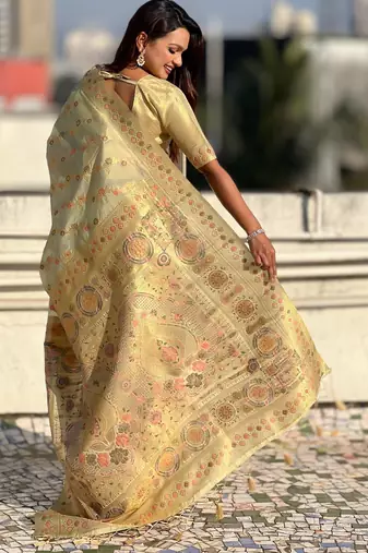 Light gold woven zari floral & traditional motifs work silk blend fabric  traditional festive style