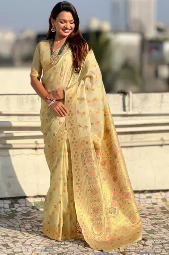 Light gold woven zari floral & traditional motifs work silk blend fabric  traditional festive style