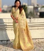 Light gold woven zari floral & traditional motifs work silk blend fabric  traditional festive style