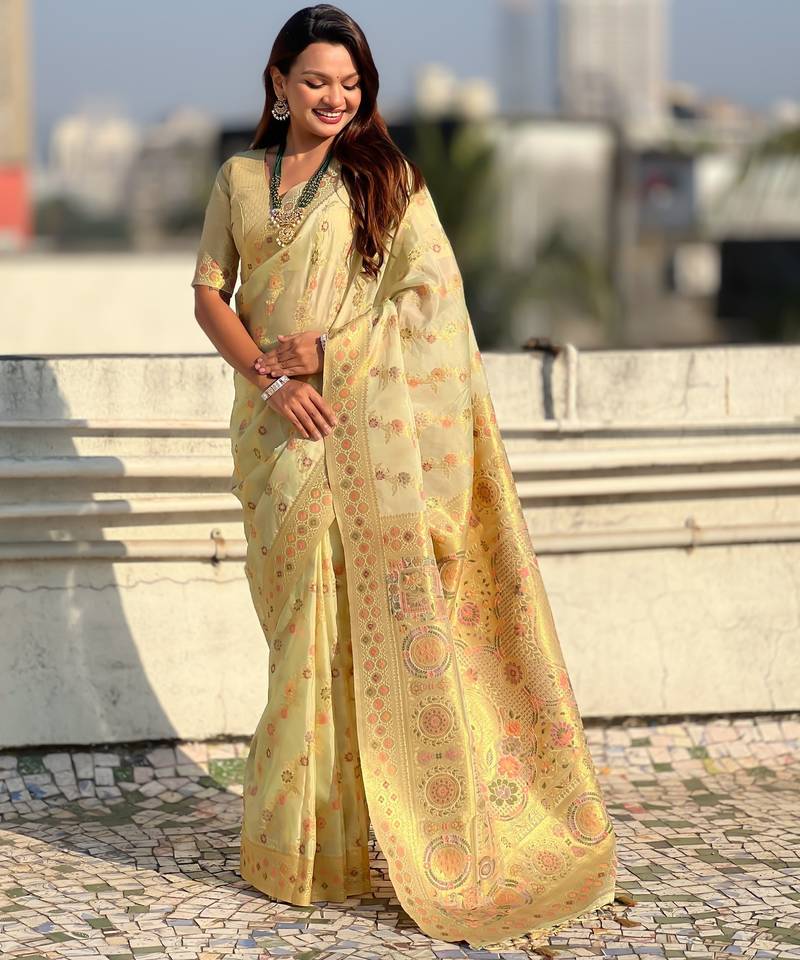 Light gold woven zari floral & traditional motifs work silk blend fabric  traditional festive style
