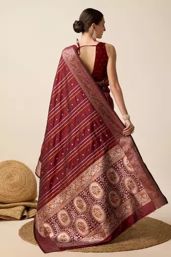 Maroon woven embellished self design pure silk kanjivaram saree with blouse
