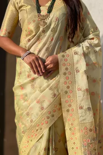 Light gold woven zari floral & traditional motifs work silk blend fabric  traditional festive style