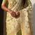 Light gold woven zari floral & traditional motifs work silk blend fabric  traditional festive style