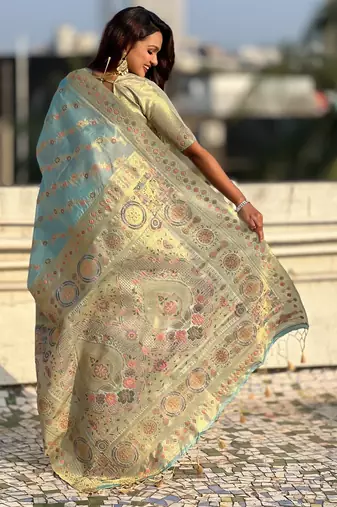 Sky blue woven zari floral & traditional motifs work silk blend fabric  traditional festive style