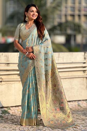 Sky blue woven zari floral & traditional motifs work silk blend fabric  traditional festive style