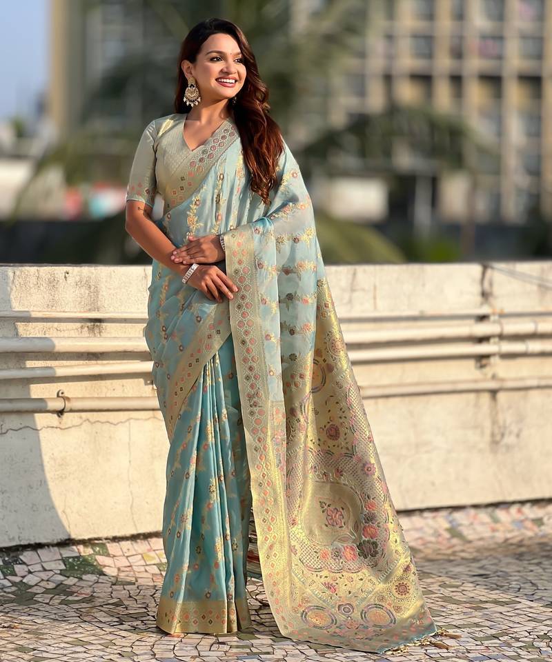 Sky blue woven zari floral & traditional motifs work silk blend fabric  traditional festive style