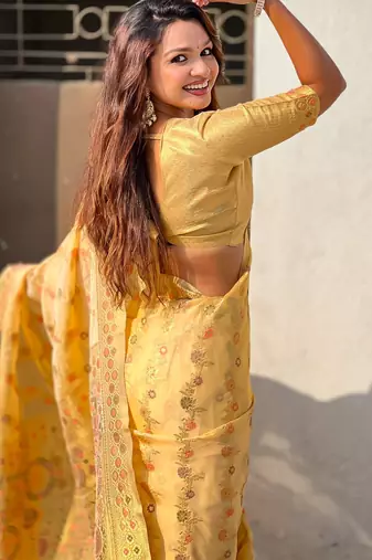 Gold woven zari floral & traditional motifs work silk blend fabric  traditional festive style