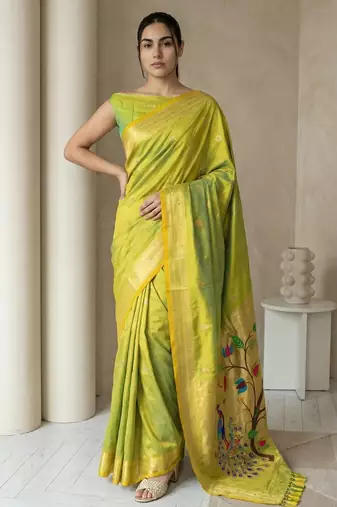Light lime woven zari buti & peacock pallu work silk blend fabric traditional festive style paithani style saree