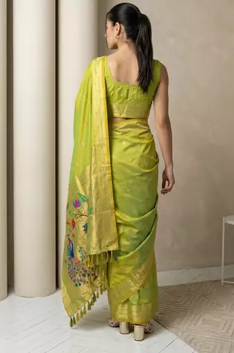 Light lime woven zari buti & peacock pallu work silk blend fabric traditional festive style paithani style saree