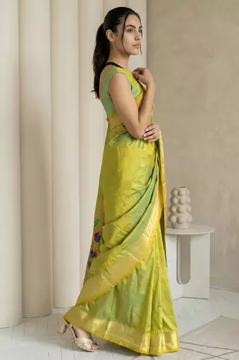 Light lime woven zari buti & peacock pallu work silk blend fabric traditional festive style paithani style saree