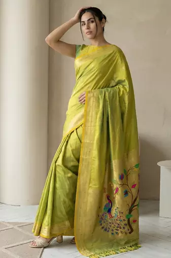 Light lime woven zari buti & peacock pallu work silk blend fabric traditional festive style paithani style saree