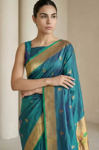 Teal woven zari buti & peacock pallu work silk blend fabric traditional festive style paithani style saree
