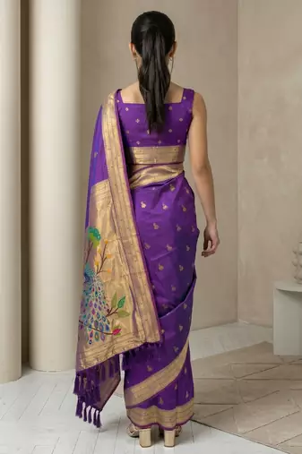 Purple woven zari buti & peacock pallu work silk blend fabric traditional festive style paithani style saree