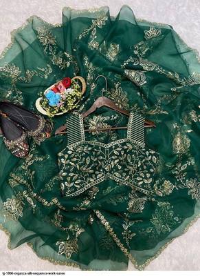 green heavy embroidered organza party wear saree 4