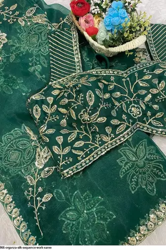green heavy embroidered organza party wear saree