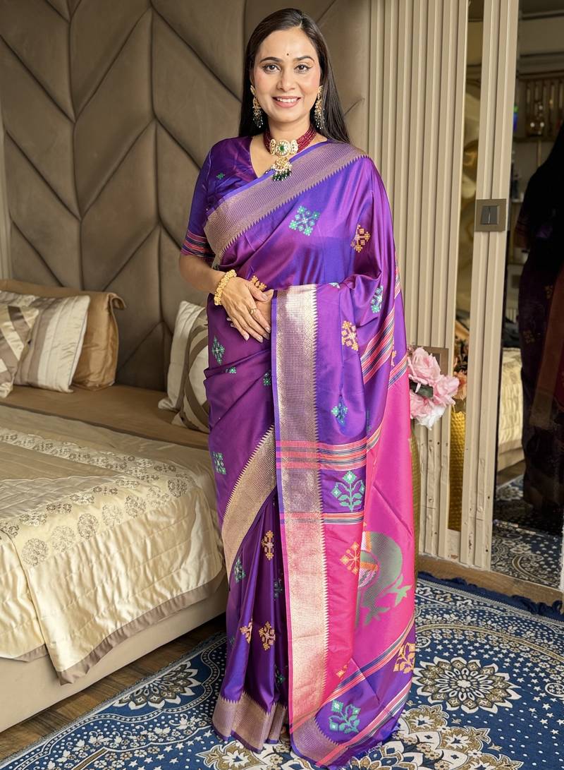 Purple woven zari buti & peacock pallu work silk blend fabric traditional festive style paithani style saree