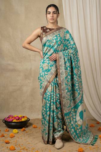 Sea green heavy woven zari floral & traditional motifs work silk blend fabric traditional grand festive