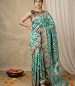 Sea green heavy woven zari floral & traditional motifs work silk blend fabric traditional grand festive