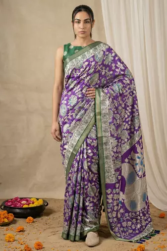 Purple heavy woven zari floral & traditional motifs work silk blend fabric traditional grand festive style
