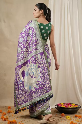 Purple heavy woven zari floral & traditional motifs work silk blend fabric traditional grand festive style