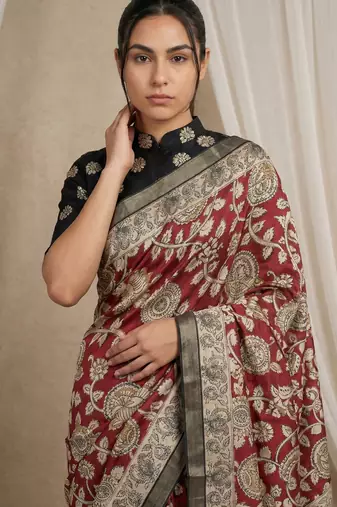 Maroon heavy woven zari floral & traditional motifs work silk blend fabric traditional grand festive style