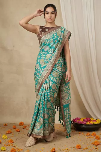 Sea green heavy woven zari floral & traditional motifs work silk blend fabric traditional grand festive