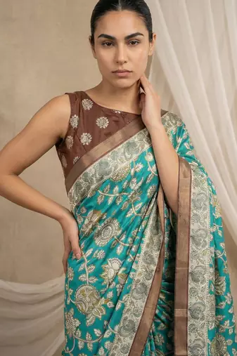 Sea green heavy woven zari floral & traditional motifs work silk blend fabric traditional grand festive