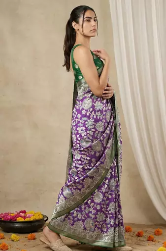 Purple heavy woven zari floral & traditional motifs work silk blend fabric traditional grand festive style