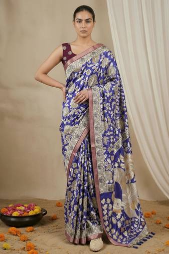 Light blue heavy woven zari floral & traditional motifs work silk blend fabric traditional grand festive style