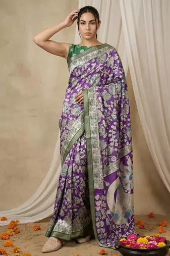 Purple heavy woven zari floral & traditional motifs work silk blend fabric traditional grand festive style
