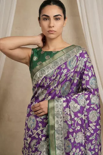 Purple heavy woven zari floral & traditional motifs work silk blend fabric traditional grand festive style