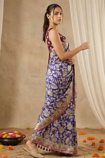 Light blue heavy woven zari floral & traditional motifs work silk blend fabric traditional grand festive style