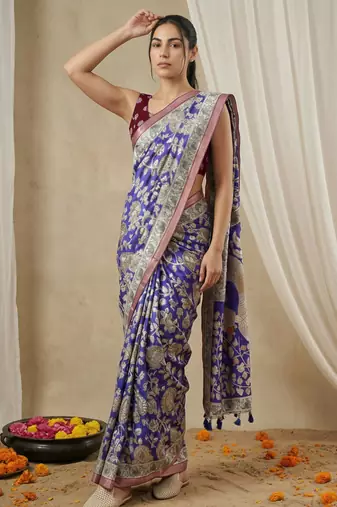 Light blue heavy woven zari floral & traditional motifs work silk blend fabric traditional grand festive style
