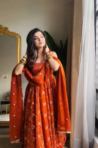 Orange color fendy silk heavy embroidery work wedding wear long gown