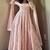Light peach color faux georgette long party wear gown