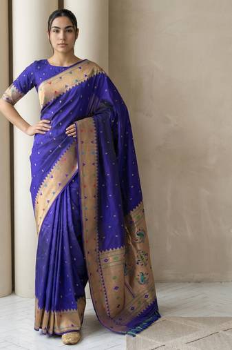Blue with gold bblder contrast traditional peacock & triangle motifs work silk blend fabric rich ethnic festive wear