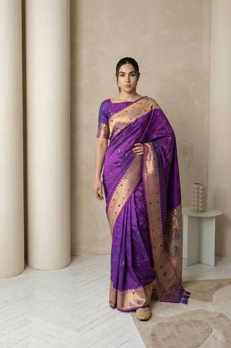 Purple with gold bpuder contrast traditional peacock & triangle motifs work silk blend fabric rich ethnic festive wear