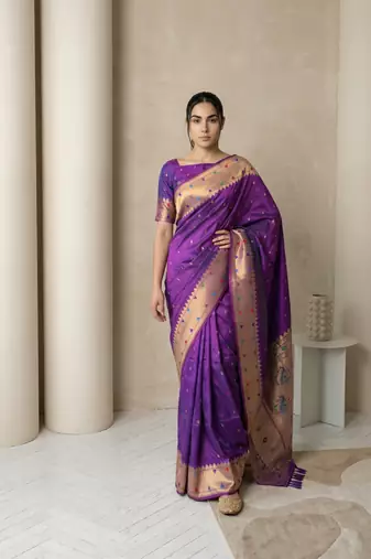 Purple with gold bpuder contrast traditional peacock & triangle motifs work silk blend fabric rich ethnic festive wear