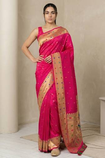 Pink with gold bpider contrast traditional peacock & triangle motifs work silk blend fabric rich ethnic festive wear