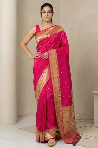 Pink with gold bpider contrast traditional peacock & triangle motifs work silk blend fabric rich ethnic festive wear