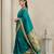Teal with gold bteder contrast traditional peacock & triangle motifs work silk blend fabric rich ethnic festive wear