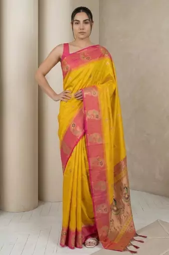 Yellow gold paisley zari motifs rich silk blend fabric elegant festive & wedding wear contrast border