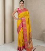 Yellow gold paisley zari motifs rich silk blend fabric elegant festive & wedding wear contrast border