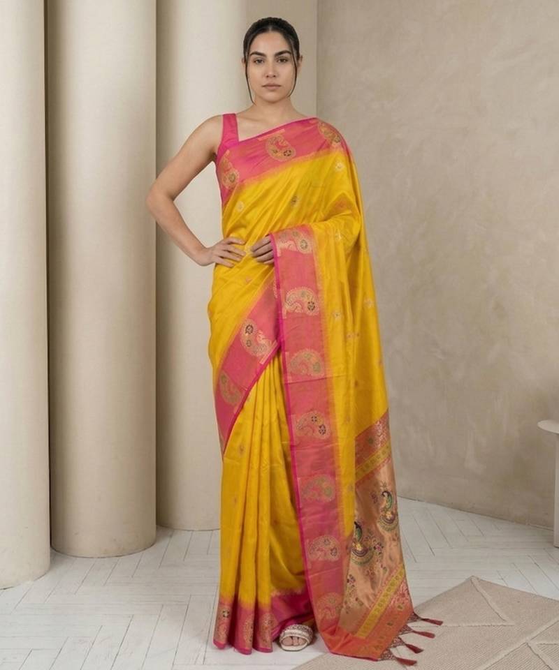 Yellow gold paisley zari motifs rich silk blend fabric elegant festive & wedding wear contrast border