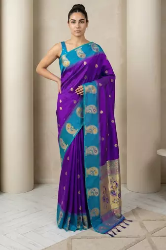 Blue gold paisley zari motifs rich silk blend fabric elegant festive & wedding wear contrast border