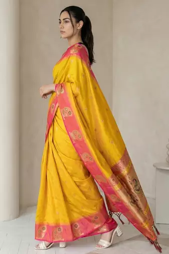 Yellow gold paisley zari motifs rich silk blend fabric elegant festive & wedding wear contrast border