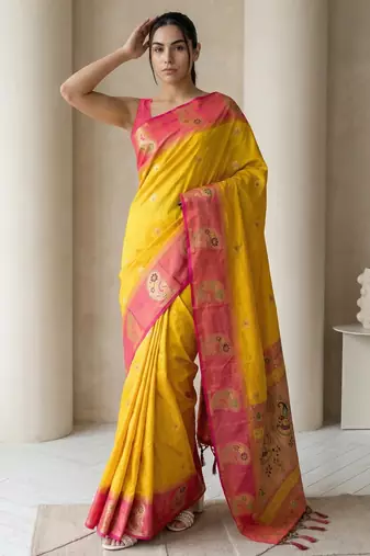 Yellow gold paisley zari motifs rich silk blend fabric elegant festive & wedding wear contrast border