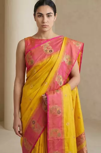 Yellow gold paisley zari motifs rich silk blend fabric elegant festive & wedding wear contrast border