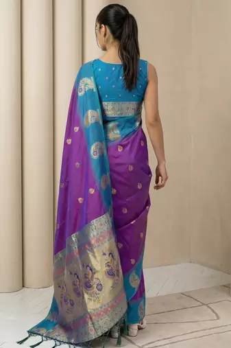 Purple gold paisley zari motifs rich silk blend fabric elegant festive & wedding wear contrast border