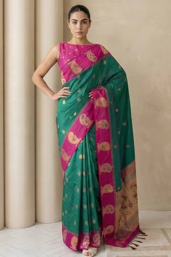 Green gold paisley zari motifs rich silk blend fabric elegant festive & wedding wear contrast border